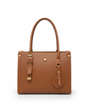 Brown handbag with gold accents on a white background
